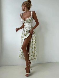 Detailed close-up of lemon floral print fabric with ruched bust and waist tailoring