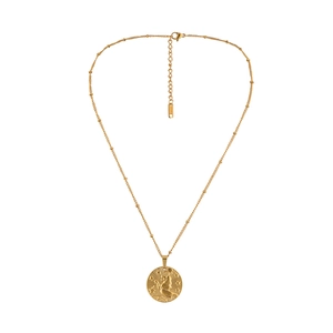 Detailed view of golden stainless steel Leo zodiac coin pendant with beaded chain