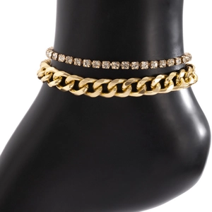 Double-layered gold Cuban link anklet with rhinestone chain on black mannequin leg