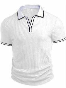 Close-up of white knit polo collar with black and white contrast striped trim details