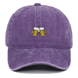 Detail of beer glasses embroidery on purple washed cotton vintage baseball cap