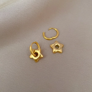 Polished gold pentagram star drop earrings with minimalist round hoops for a sleek look