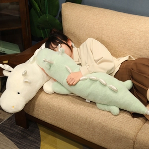 Long soft cartoon dragon plush pillow used as a cozy sleeping bolster for adults and kids