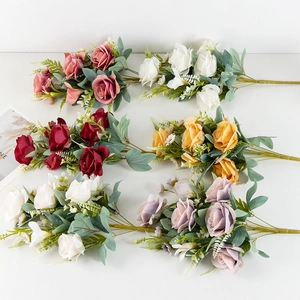 Detail of multi-head artificial roses in six vibrant colors for wedding floral decor