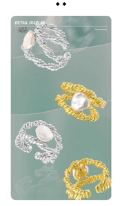 Close-up of S925 sterling silver ring with twisted rope design and baroque pearl detail