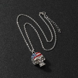 Hip hop skull pendant necklace with American flag rhinestones on a silver chain