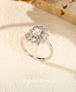 Close-up of luxury S925 sterling silver ring with emerald-cut stone and sunflower halo
