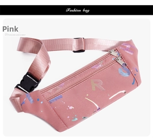 Close-up of pink fitness waist bag with dual zippers and colorful holographic lettering