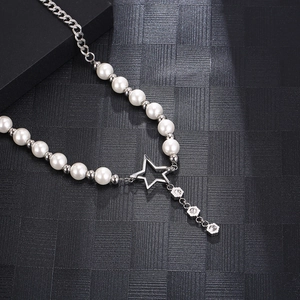Titanium steel pearl necklace with hollow star and rhinestone flower charms