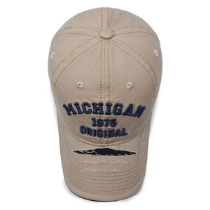 Retro khaki baseball cap with blue Michigan embroidery and distressed frayed brim design
