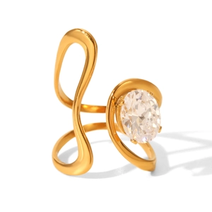 Detail of gold open ring with an oval clear zircon on minimalist organic metal lines