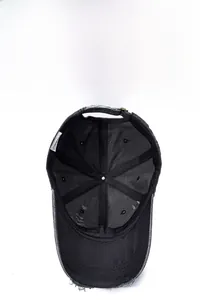 Detail view of the breathable cotton lining and inner structure of the washed baseball cap