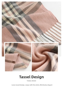Detail of pink and grey plaid scarf showing soft fringe tassels and twill fabric texture