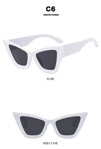 Front and side views of trendy white cat-eye sunglasses with dark polarized lenses
