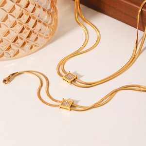 Double-layer gold snake chain necklace and bracelet set with square zircon pendant