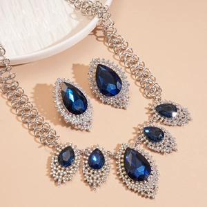 Vintage necklace and earrings set with waterdrop blue gems and sparkly rhinestones