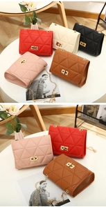 Quilted triangle stitching pattern on crossbody bags with gold metal rotating locks