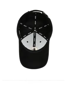 Detail view of the black baseball cap interior with ANED branded tape and metal buckle
