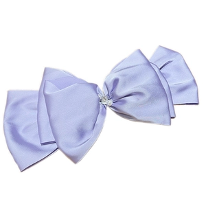 Elegant purple satin bow hair clip with central pearl and rhinestone embellishments