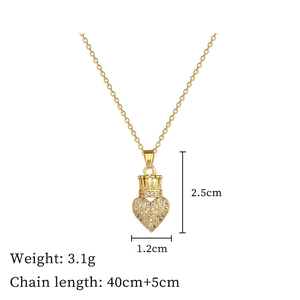 Detailed view of gold crown heart pendant with dimensions 2.5cm by 1.2cm and 3.1g weight