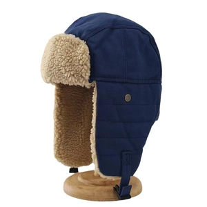 Winter navy aviator hat with warm faux lamb wool lining and adjustable ear flaps