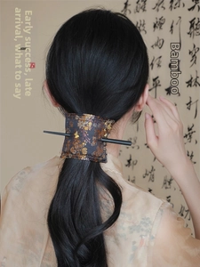 Detailed embroidery texture on Chinese style fabric hair clip with wooden hairpin