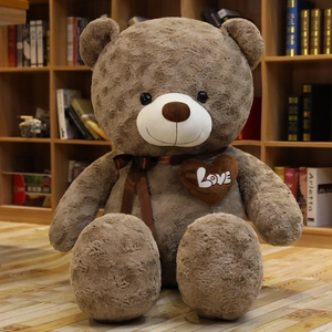 Detailed close-up of rose textured teddy bear plush with Love heart embroidery