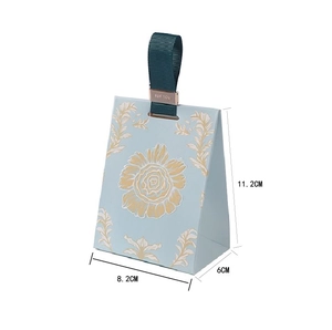 Detailed dimensions of blue floral wedding favor box with ribbon and metal tag