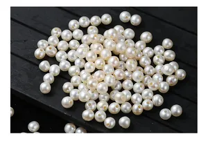 Macro detail of 4-5mm natural freshwater pearls with large holes for DIY jewelry making