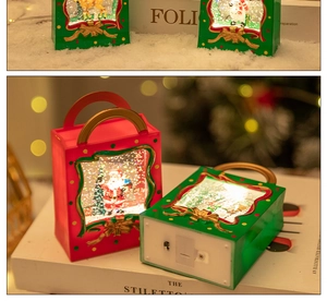 Detail of Christmas lantern base showing the battery compartment and power switch