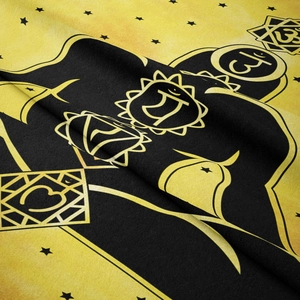 Detailed view of yellow and black chakra tapestry fabric with soft microfiber texture