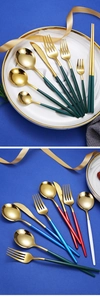 Detail of 304 stainless steel gold plated cutlery set with colorful handles on marble plate
