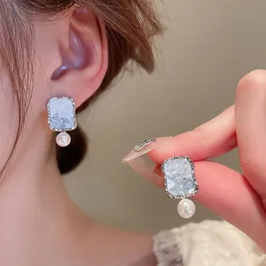 Elegant silver rectangle earrings with gradient blue crystals and white pearl drops