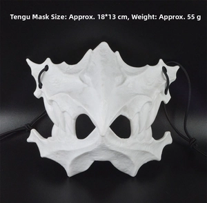Macro shot of white Tengu mask 18x13cm, weighing 55g with detailed bone texture