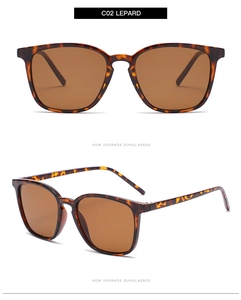 Detail view of leopard print square sunglasses with dark brown lenses and sturdy frame
