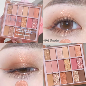 Macro detail of 18-color eyeshadow palette with matte and shimmer makeup application