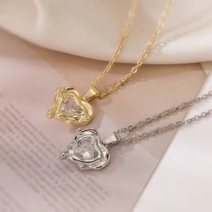 Elegant gold and silver heart necklaces with liquid metal texture and clear zircon stones