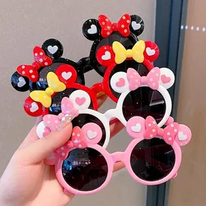 Set of four cute cartoon sunglasses for girls with polka dot bows and round heart ears