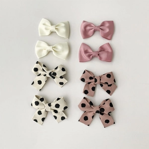 Set of 8 striped and solid grosgrain ribbon bow hair clips for kids in pink and cream
