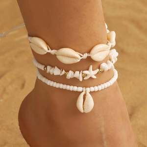 Bohemian multilayer anklet set with starfish, shells and white beads for beach vacations
