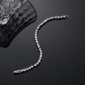 Elegant S925 sterling silver tennis bracelet with assorted zircon stones on black background