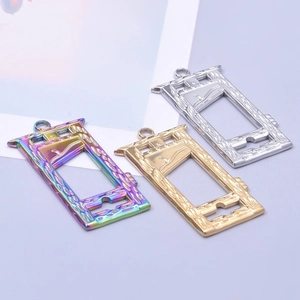 Detailed view of rectangular stainless steel pendants in colorful, gold, and silver finishes