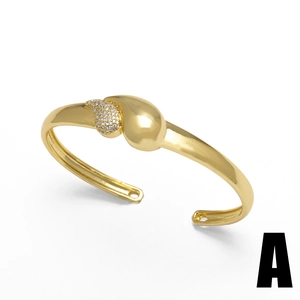 Polished 18k gold plated open bangle featuring teardrop charms with pavé crystals
