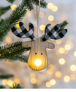 Close-up of wooden reindeer head ornament with LED light and plaid antlers on Christmas tree
