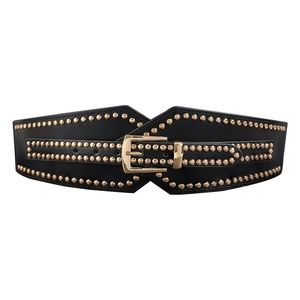 Women's black elastic wide belt featuring gold spherical studs and metal buckle closure