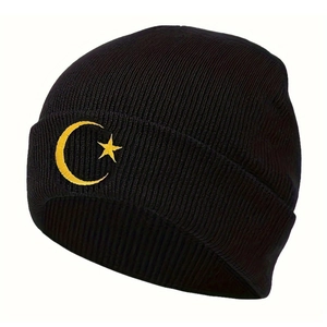 Black knit beanie with yellow star and moon embroidery for winter warmth and style