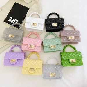 Detailed grid of colorful PVC jelly handbags featuring quilted patterns and pearl handles