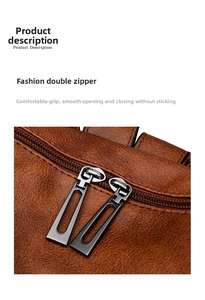 Close-up of high-quality double metal zipper and textured brown leather on the backpack