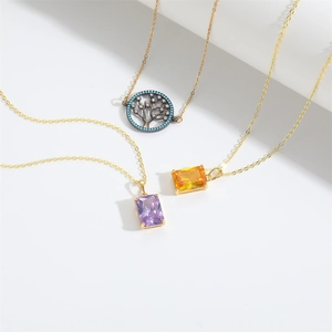 Ethnic gold necklace set with Wishing Tree pendant and colorful gemstone charms