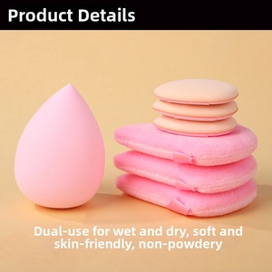 Detail view of pink beauty blender and round cushion puffs for soft makeup application